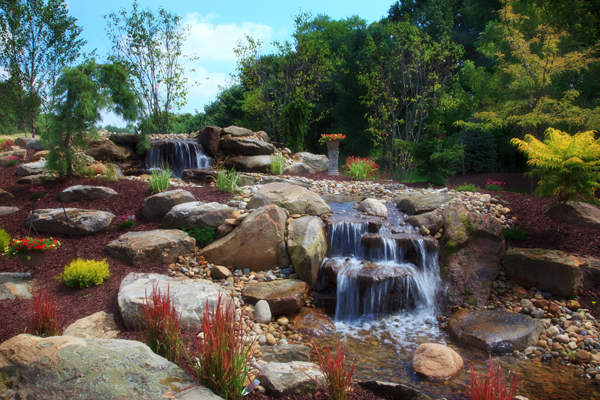 Pondless Waterfall with Colorful Landsaping